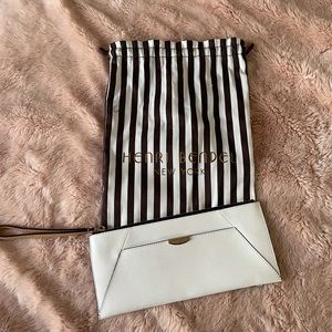 Henri Bendel white and tan clutch / wristlet.
